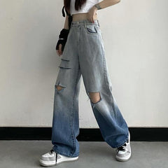 Weite Jeans mit Farbverlauf und Rissen an den Knien