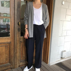 Cárdigan gris holgado de manga larga con botones finos