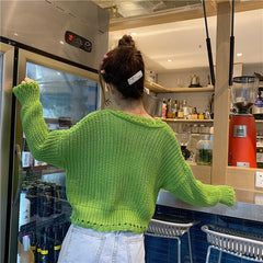 Suéter holgado corto de punto con estética vintage en verde y blanco