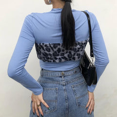 Top de manga larga con estampado de piel sintética de leopardo grunge
