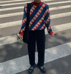 Suéter de punto con cuello medio y estampado de corazones