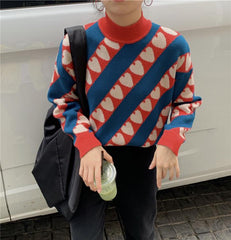 Suéter de punto con cuello medio y estampado de corazones