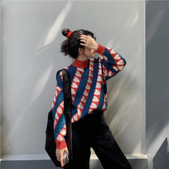 Suéter de punto con cuello medio y estampado de corazones