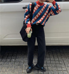 Suéter de punto con cuello medio y estampado de corazones