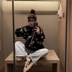 Suéter de punto extragrande con estampado de letras "Hola"