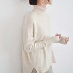 Suéter largo de punto acanalado con cuello alto