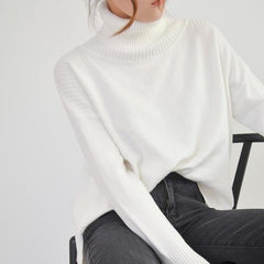 Suéter largo de punto acanalado con cuello alto