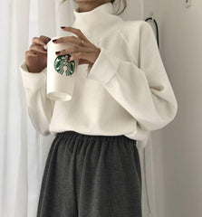 Suéter holgado de canalé con cuello alto de tortuga