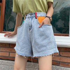 Shorts vaqueros azules de cintura alta con bolsillos coloridos