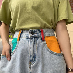 Shorts vaqueros azules de cintura alta con bolsillos coloridos