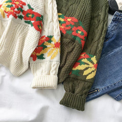 Suéter cálido de punto con trenzas blancas y verdes para las fiestas