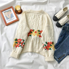 Suéter cálido de punto con trenzas blancas y verdes para las fiestas