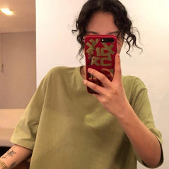 Camiseta extragrande de cuello redondo y colores lisos