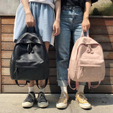 Mochila minimalista de cuero con cremallera estilo universitario