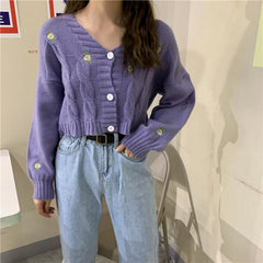 Suéter de punto vintage con cuello en V y pequeñas flores en color lila y negro