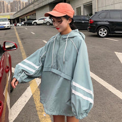 Cortavientos deportivo holgado con capucha y mangas murciélago