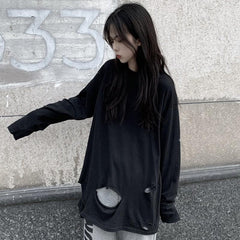 Camiseta holgada de manga larga con agujeros rotos