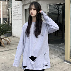 Camiseta holgada de manga larga con agujeros rotos