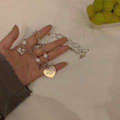 Collar de cadena con colgante de corazón "Te amo más" de Tumblr