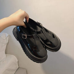 Sandalias de plataforma retro negras mate y brillantes