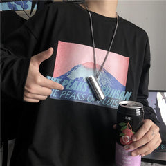 Weißes Oversize-T-Shirt mit langen Ärmeln und Berg-Print