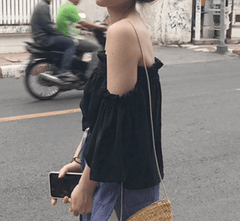 Top de verano ligero con volumen y hombros abiertos