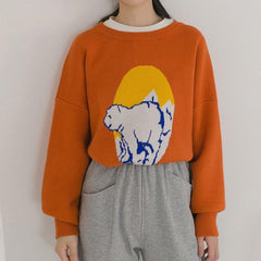 Suéter de punto negro y naranja de oso polar kawaii de gran tamaño