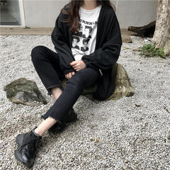 Cárdigan de punto extragrande con estética pastel