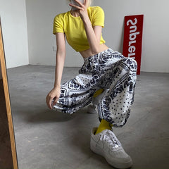 Pantalones deportivos holgados con estampado de cachemira