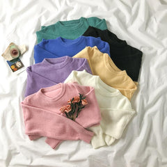 Suéter de punto extragrande con cuello redondo y estética pastel