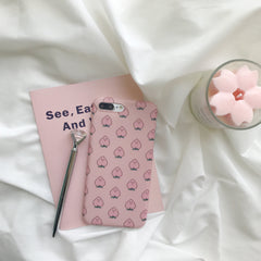 Funda para iPhone rosa con estampado de caras de melocotón