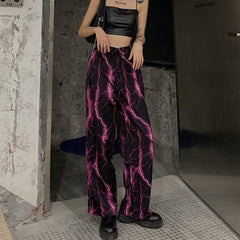 Pantalones anchos con cintura elástica y estampado de rayos rosas