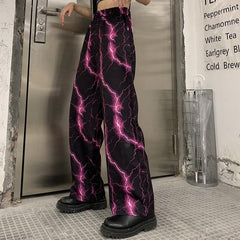 Pantalones anchos con cintura elástica y estampado de rayos rosas