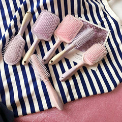 Cepillo de pelo de masaje de plástico rosa lila