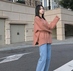 Suéter de punto de cuello redondo extragrande con cortes laterales en color rosa