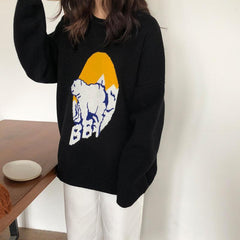 Suéter holgado de punto de oso polar negro y naranja