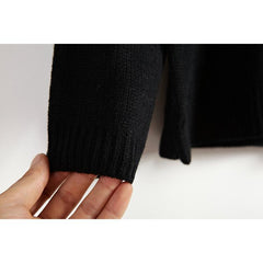 Suéter con líneas de punto arcoíris