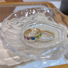 Conjunto de dos piezas de anillo de metal arcoíris y perlas