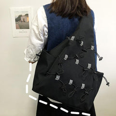 Bolso bandolera grande negro con parches reflectantes Teen Trend