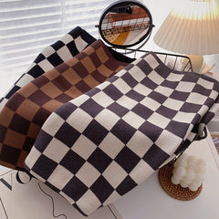 Retro-ästhetischer karierter Strick-Minirock mit hoher Taille