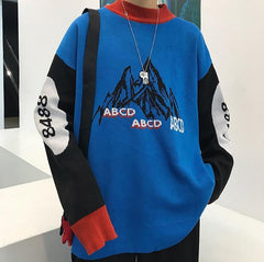 Suéter holgado con estampado de montaña retro beige y azul