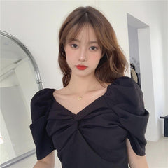 Blusa retro elegante de manga corta con nudo en el pecho