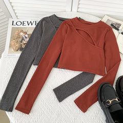 Top corto de manga larga acanalado y calado