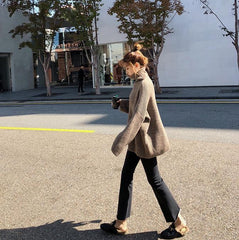 Suéter holgado de cuello alto y punto acanalado