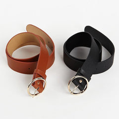 Cinturón vintage de cuero negro con hebilla redonda