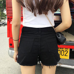 Venta de pantalones cortos vaqueros rotos con rayas laterales negras