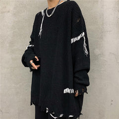 Suéter suelto de punto estilo grunge con flecos rotos en oferta