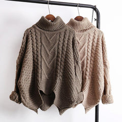 Suéter cálido de punto grueso con trenzas en colores tierra en oferta
