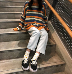 Suéter oversize a rayas gris, amarillo y azul en oferta