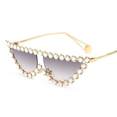 Gafas de sol con montura metálica brillante y elegante con diamantes